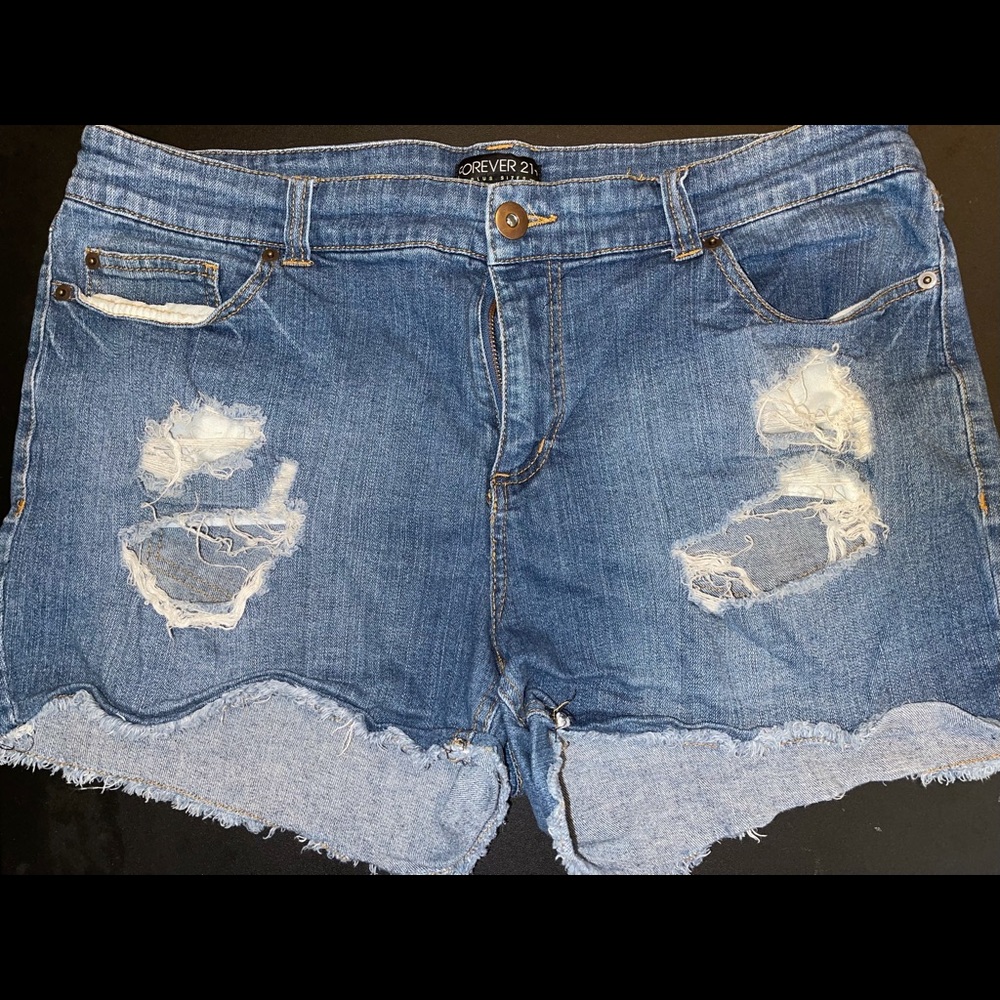 Distressed denim shorts